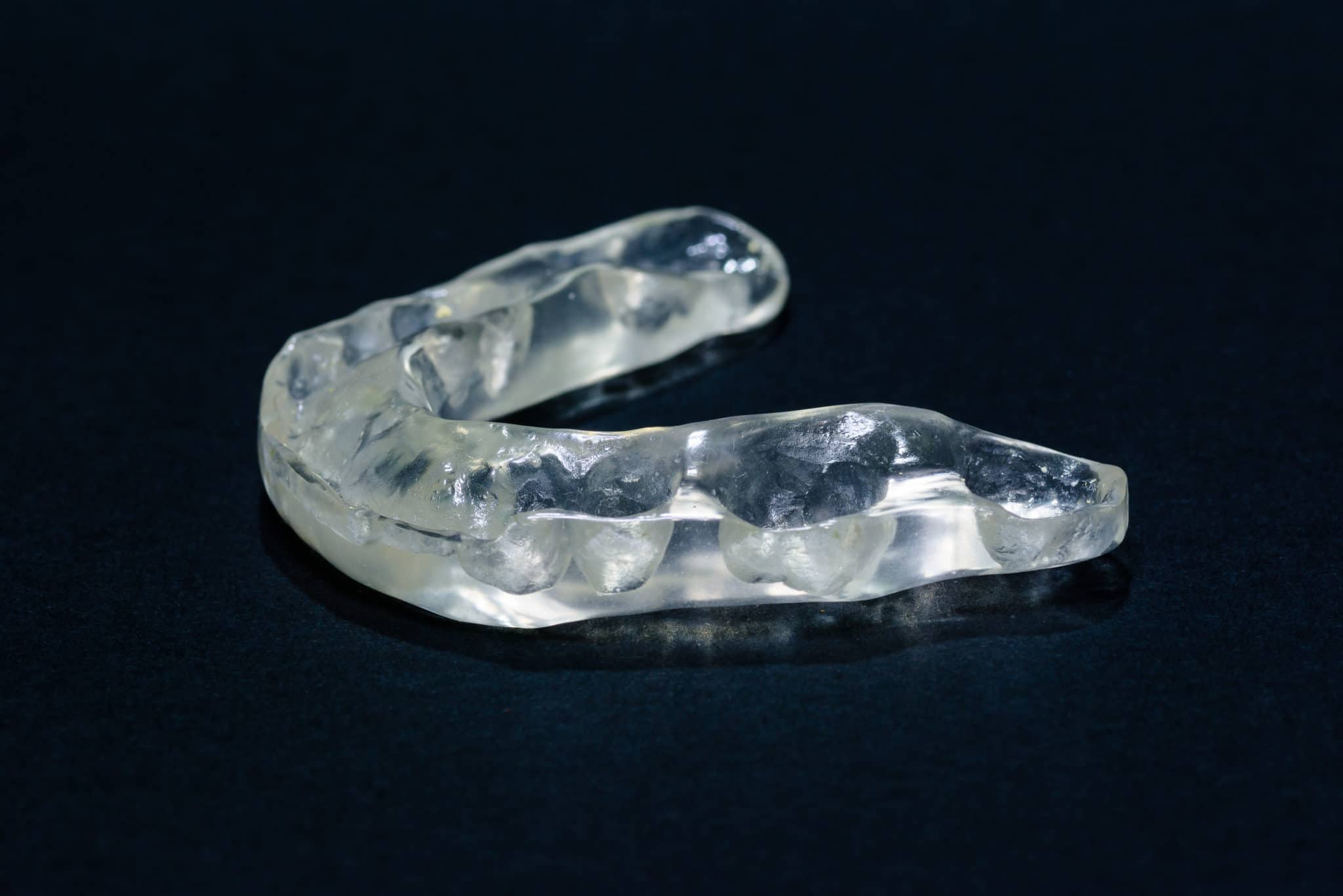 tmj disorder treated by occlusal splint orthotic mouthguard icon